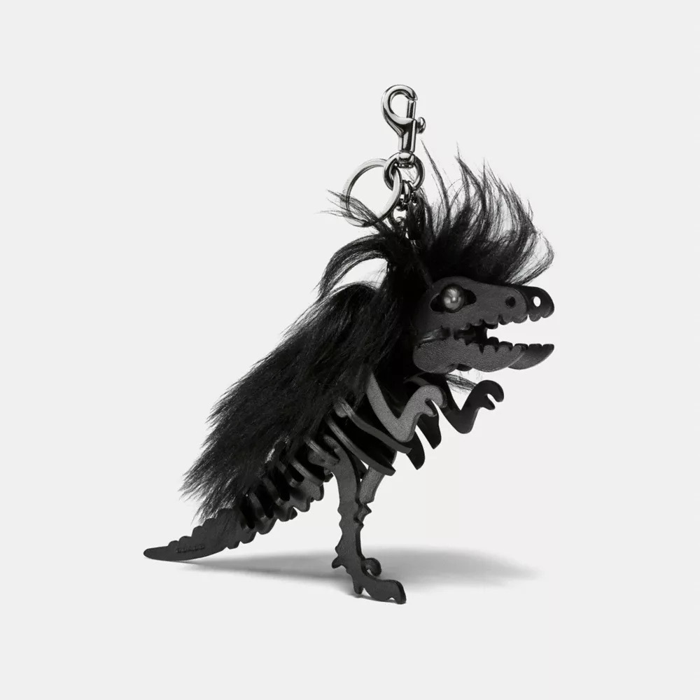 Coach Long Mohawk Rexy bag charm in black shearling and leather